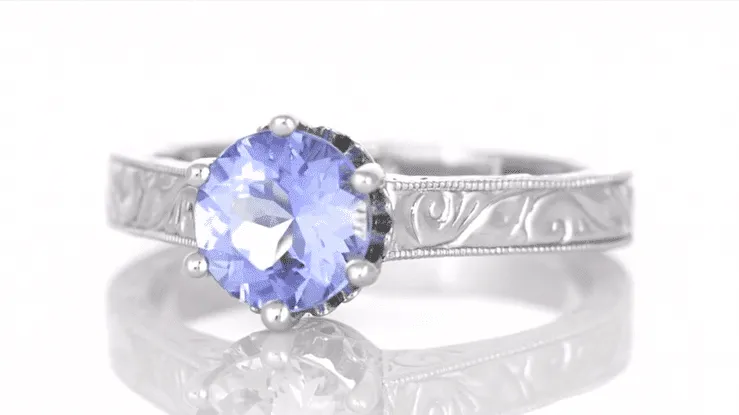 Art Deco Carved Filigree Scrolls Crown Tanzanite Solitaire Engagement Ring in 18 Karat White Gold