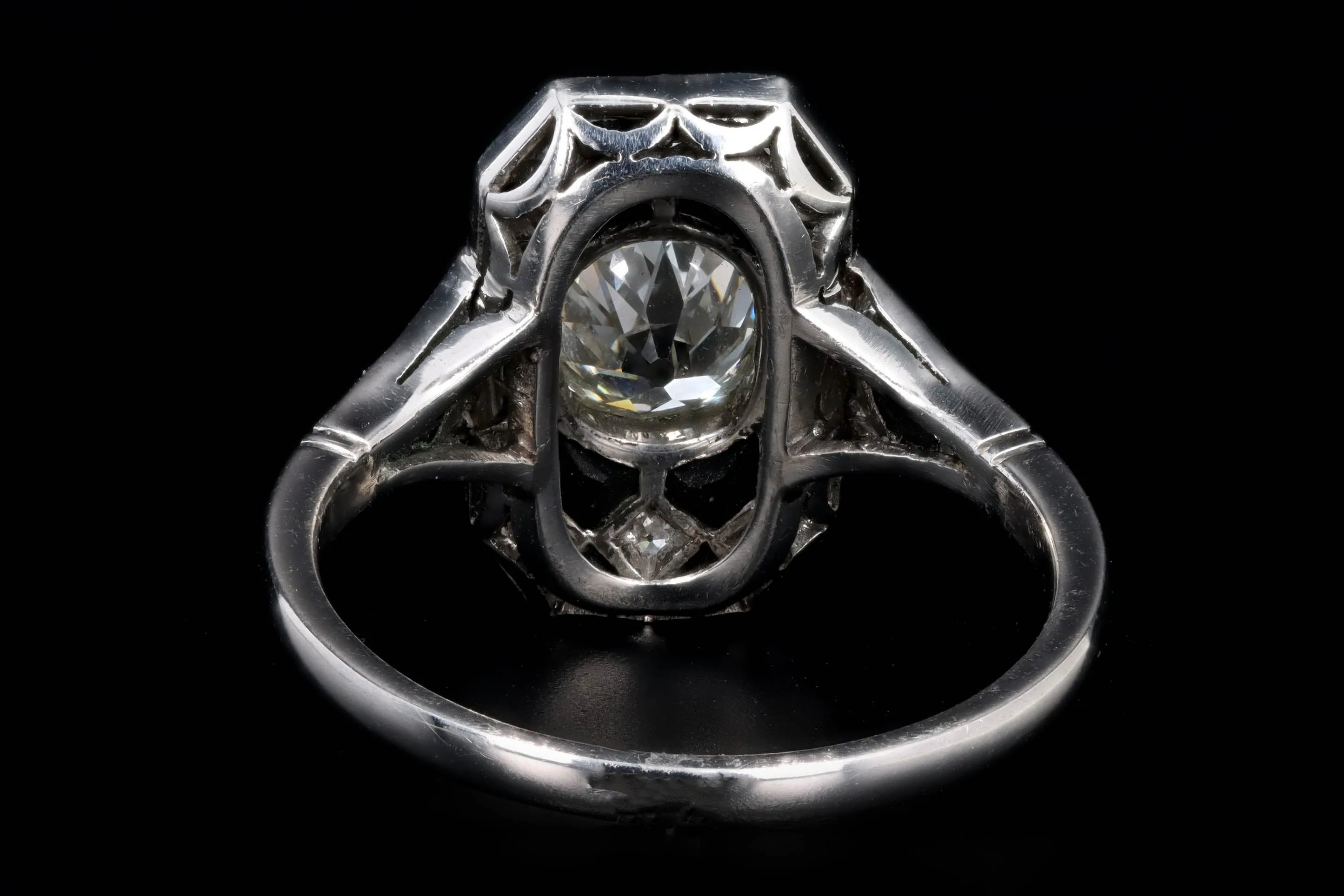 Art Deco Inspired Platinum 0.80 Carat Old European Oval Cut Diamond & Onyx Ring