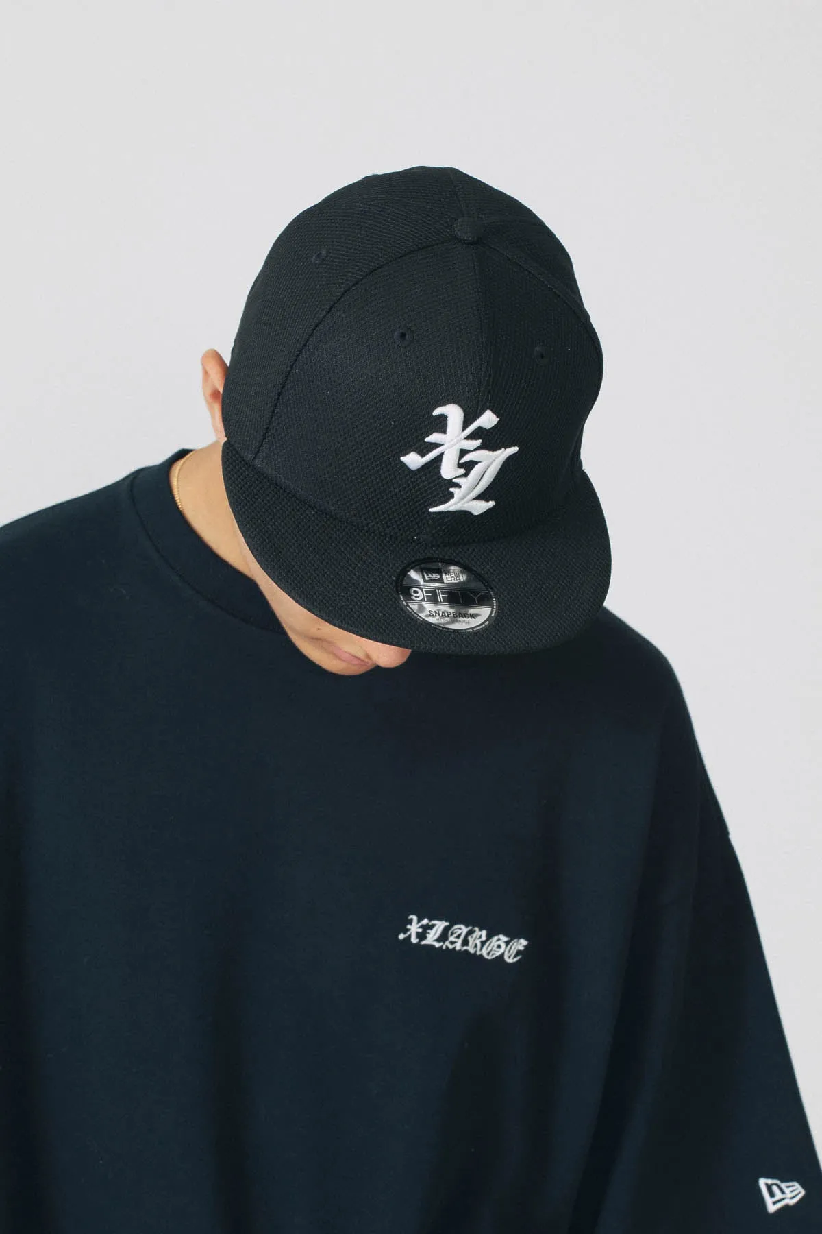 XLARGE × NEW ERA 9FIFTY CAP - BLACK